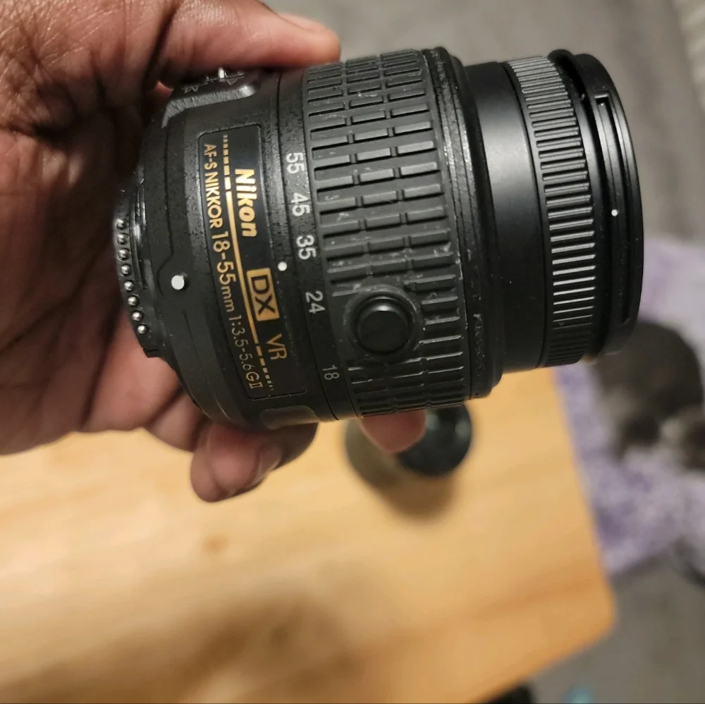 Nikon D3300, 18-55mm lens, 55-200mm lens, and power adapter